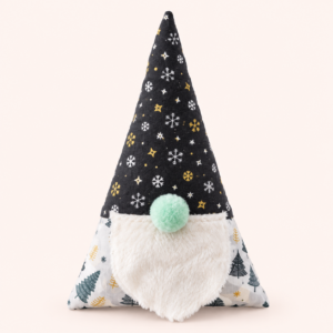 Handgemachter dunkelblauer Türstopper als Weihnachtswichtel mit Schneeflockenmütze und mintfarbenem Bommel